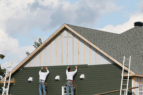 Professional Siding Installation technician working in Merritt Island, FL